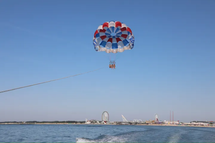 a parachute with a body of water