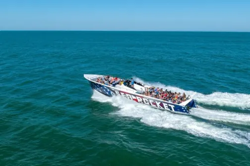 a small boat in a body of water