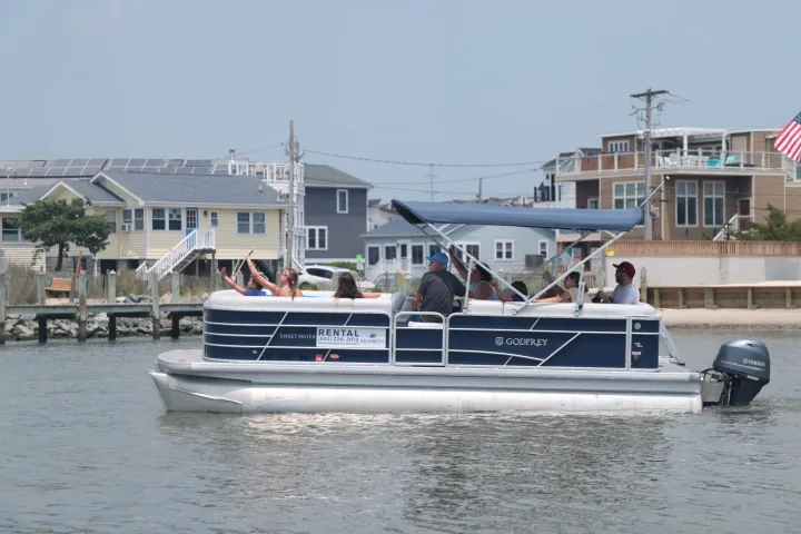 a boat is docked next to a body of water