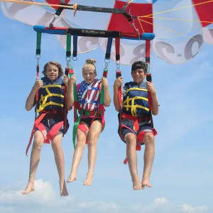 a group of people on a beach