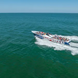 a small boat in a body of water