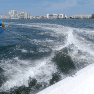 a person riding a wave on a surfboard in the water