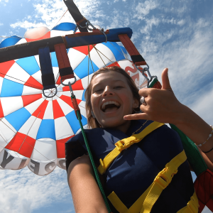 a person holding a colorful umbrella