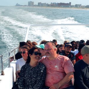 a group of people standing in front of a body of water