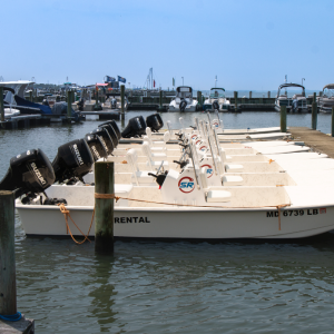 a boat is docked next to a body of water