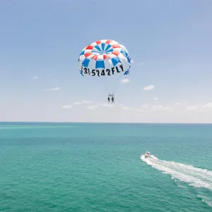 a parachute with a body of water