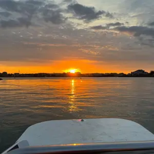 a sunset over a body of water