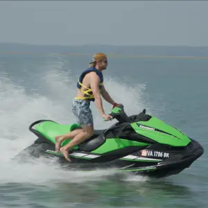 a man riding a wave on a surfboard in the water