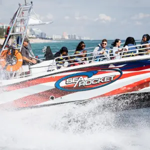 a group of people on a boat in the water